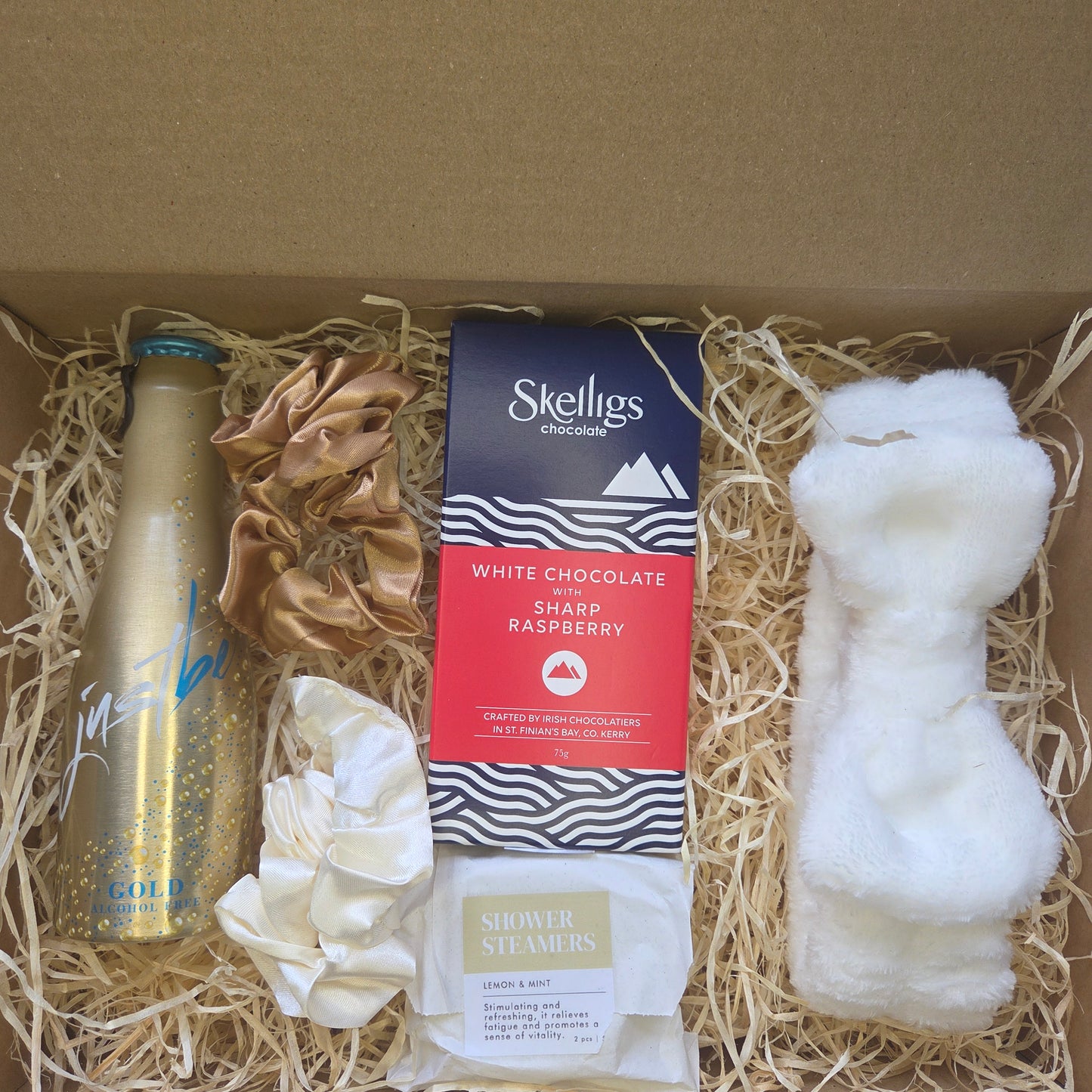 Gift set with Skelligs chocolate, and other items in a box.
