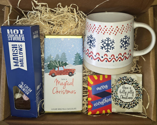 Christmas hot chocolate gift box with festive mug, Irish milk chocolate bar, marshmallow hot chocolate stirrer and Christmas tea bags