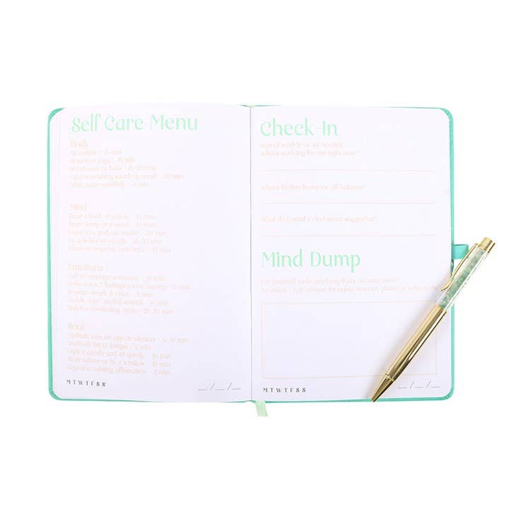 wellness journal with guided pages and crystal pen