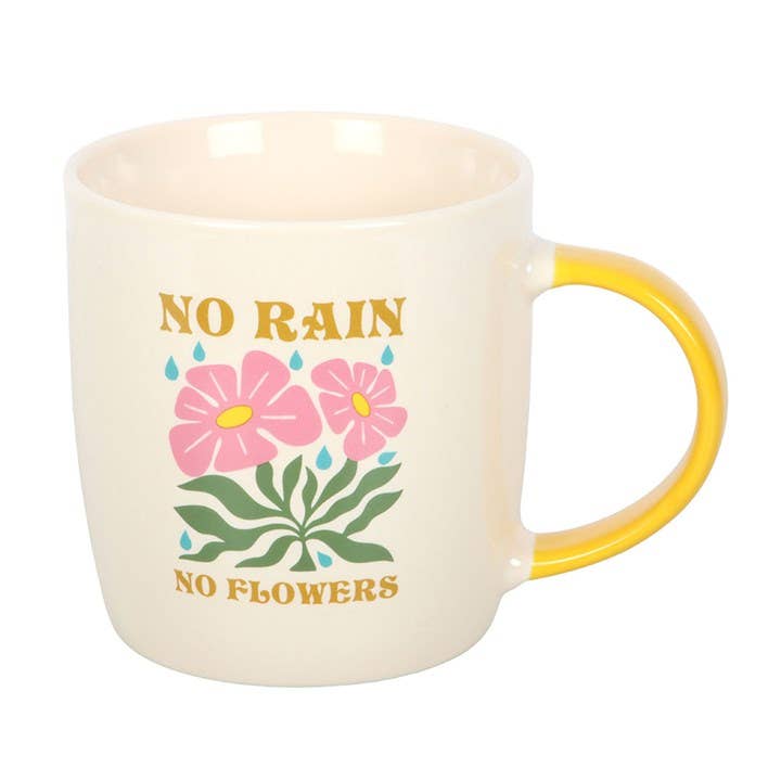 Mug with floral design and 'No Rain No Flowers' text on a white background