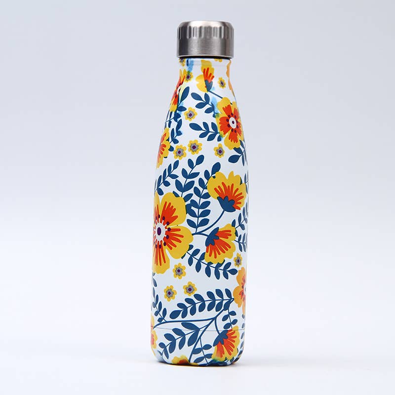 A reusable metal water bottle with a white background and a colorful floral pattern featuring yellow, orange, and blue flowers and leaves, topped with a silver screw cap.