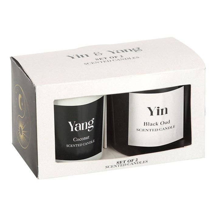 Set of two scented candles in packaging labeled 'Yin' and 'Yang'.